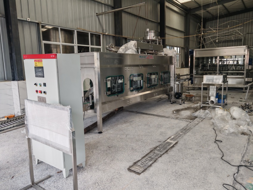 Bucket Washer-Filler Working Principle: How Multi-Stage Cleaning, Filling, and Capping Prevent Contamination in Barrel W